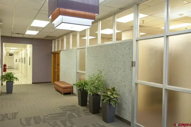 a front view of a building with street view