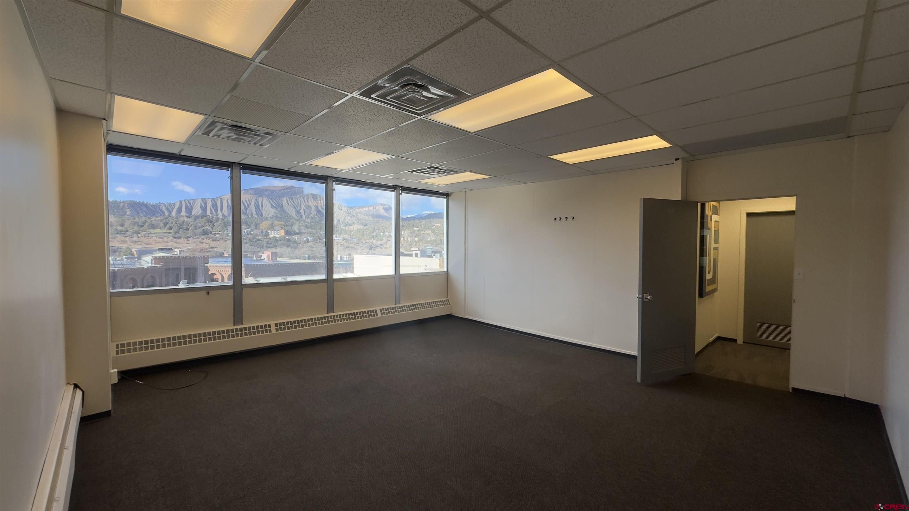835 East 2nd Avenue, Unit 323 Durango, CO 81301 - Photo 4 of 23 a view of an empty room with a window