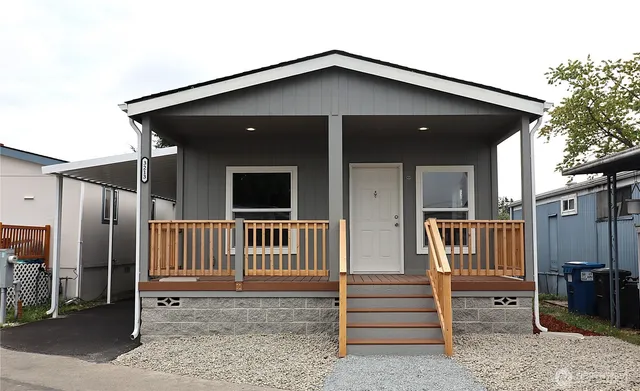 a view of an empty room and wooden floor