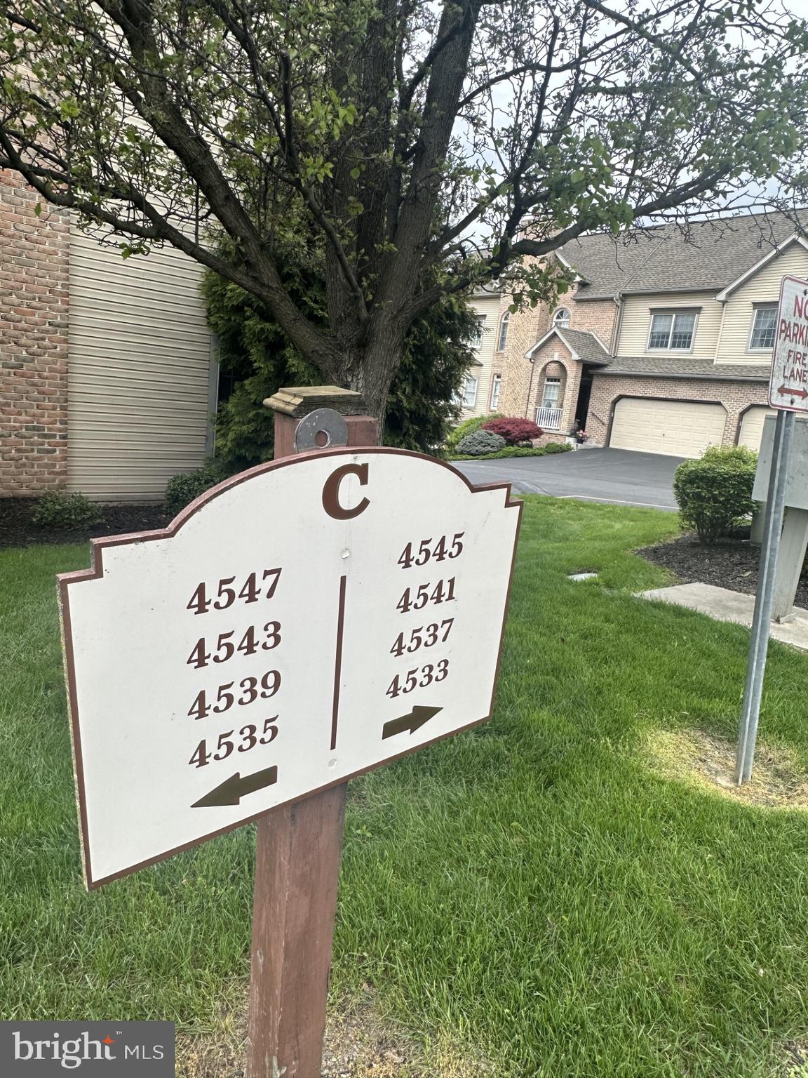 4537 Deer Path Road Harrisburg, PA 17110 - Photo 29 of 29 Building Sign to the Right of Driveway Parking