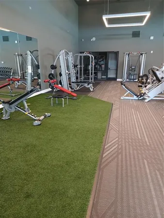 a room with lots of gym equipment