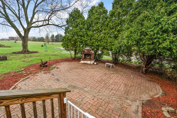 a view of a house with wooden deck
