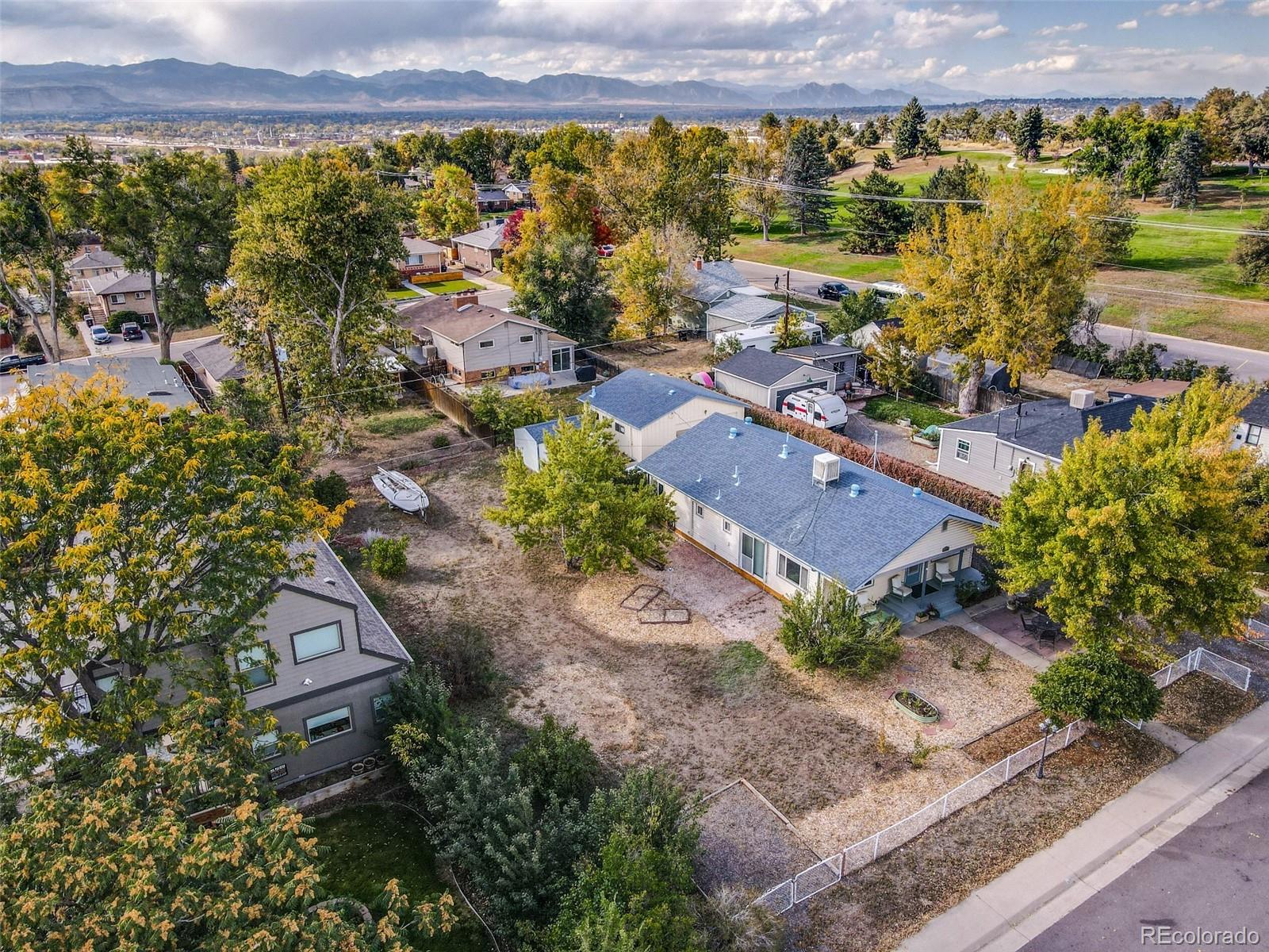 4877 Chase Street Denver, CO 80212 - Photo 2 of 4 an aerial view of a house with a lake view