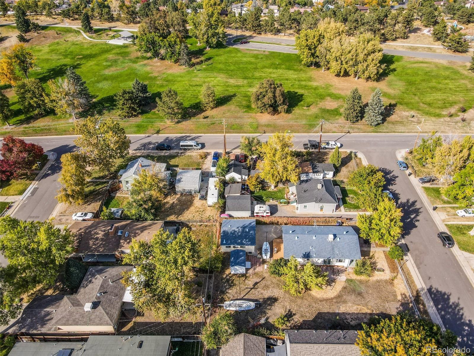 4877 Chase Street Denver, CO 80212 - Photo 4 of 4 a view of a lake with a building in the background