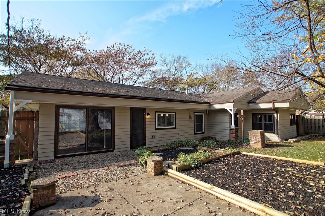 8063 Middlesex Road Mentor, OH 44060 - Photo 19 of 35 The cement patio leads to a gravel terrace.