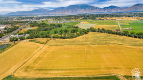 19 East Southfield Road Spanish Fork, UT 84660 - Photo 8 of 74 Overview of rural landscape with mountains and extensive farmland