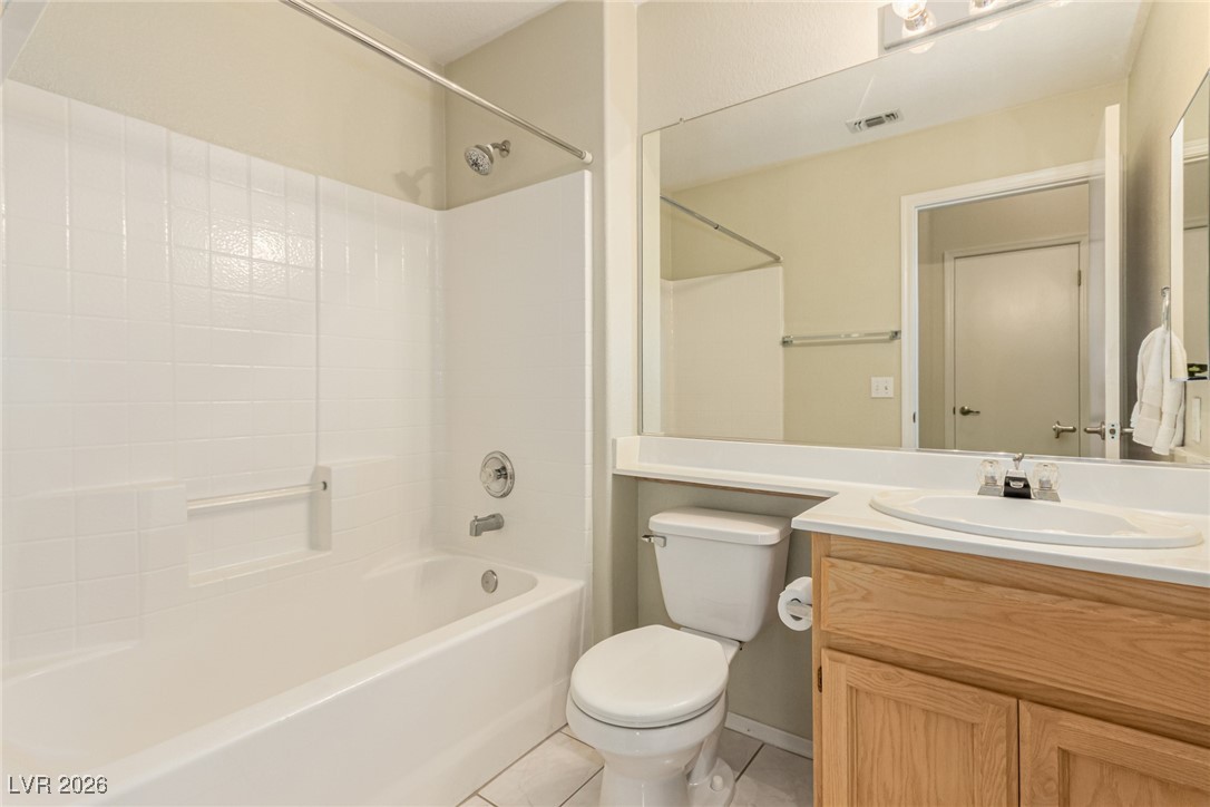 2148 Point Mallard Drive Henderson, NV 89012 - Photo 22 of 31 Bathroom with vanity, shower / washtub combination, and tile patterned floors