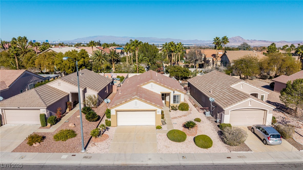 2148 Point Mallard Drive Henderson, NV 89012 - Photo 26 of 31 Aerial perspective of suburban area with a mountainous background