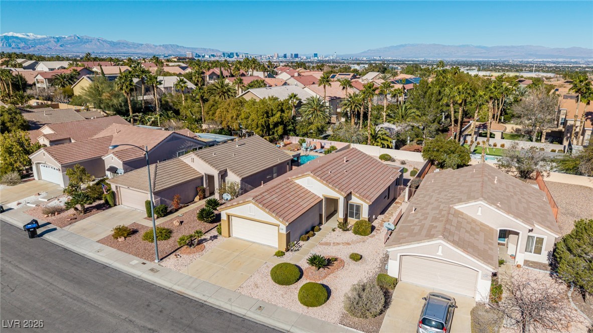 2148 Point Mallard Drive Henderson, NV 89012 - Photo 3 of 31 Aerial perspective of suburban area featuring a mountain backdrop