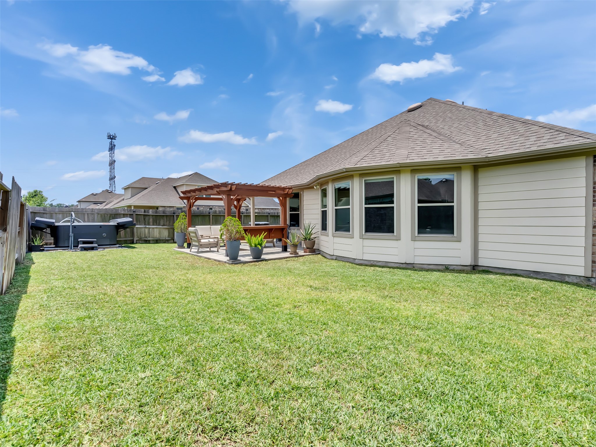 27997 Lone Hollow Lane Spring, TX 77386 - Photo 12 of 45 a view of a house with a garden and yard