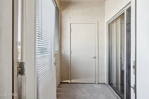 a view of a bathroom from a hallway