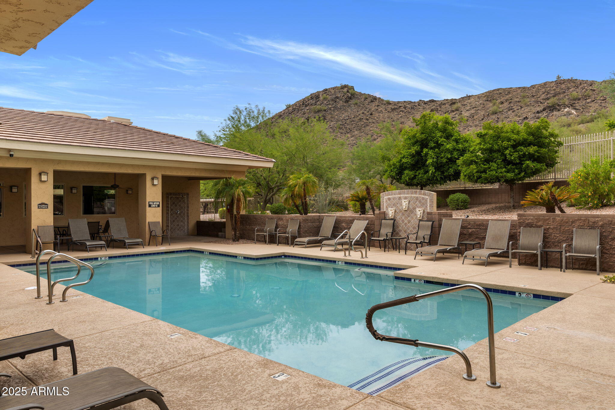 9820 North Central Avenue, Unit 317 Phoenix, AZ 85020 - Photo 22 of 26 a view of a house with swimming pool and sitting area