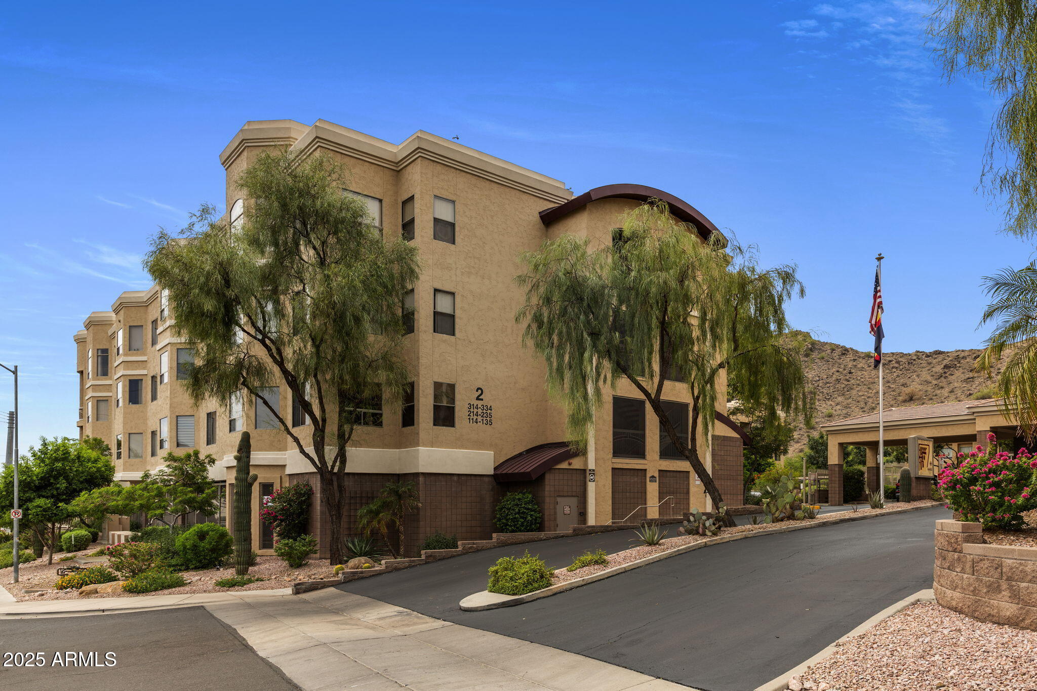 9820 North Central Avenue, Unit 317 Phoenix, AZ 85020 - Photo 24 of 26 a view of a building with a street