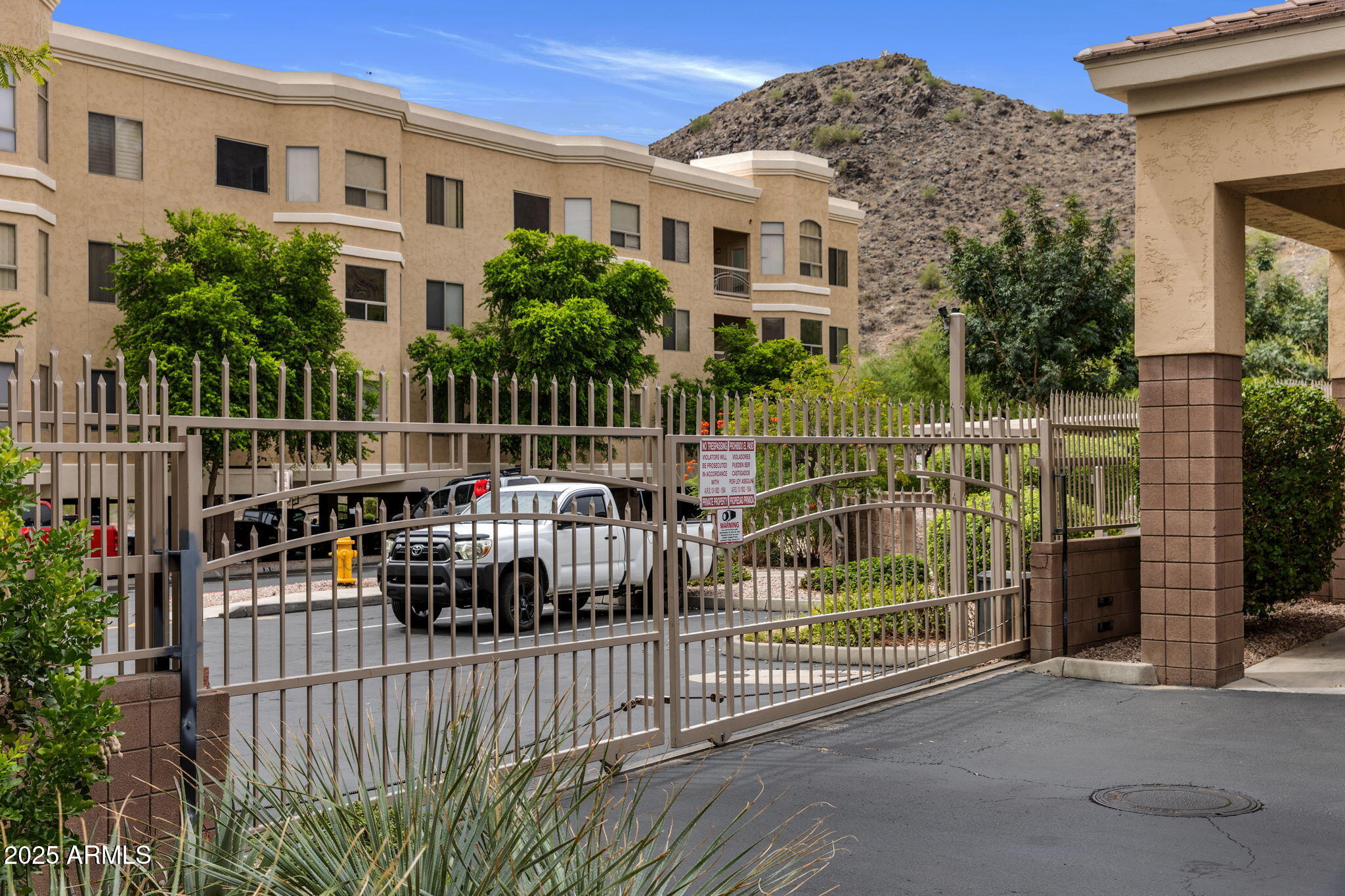 9820 North Central Avenue, Unit 317 Phoenix, AZ 85020 - Photo 25 of 26 a view of a house with iron fence