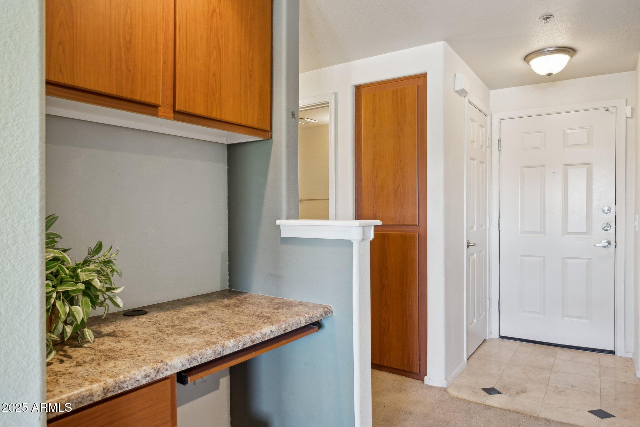 9820 North Central Avenue, Unit 317 Phoenix, AZ 85020 - Photo 4 of 26 a view of kitchen with cabinets