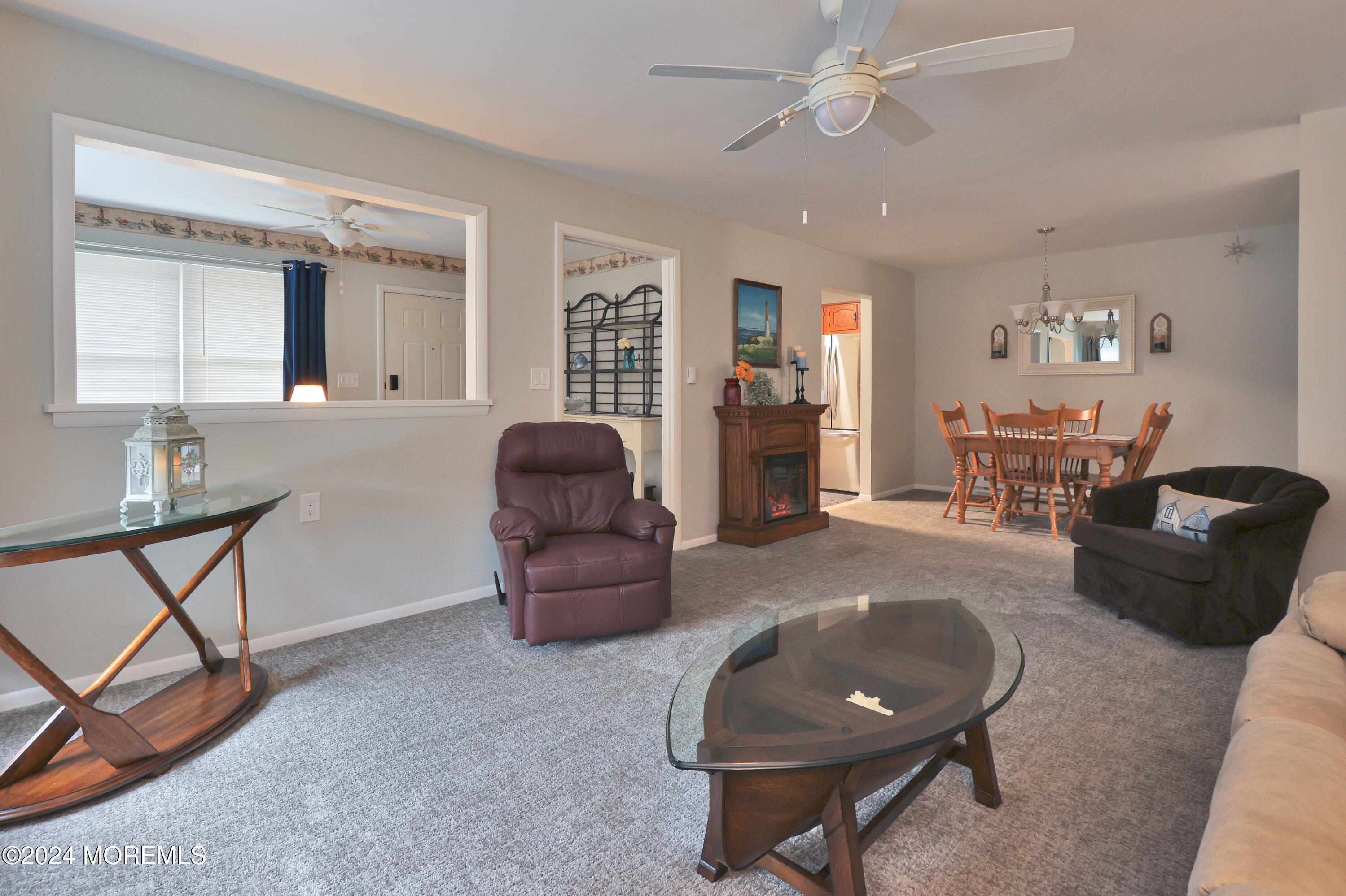 20 Cranberry Road, Unit 8 Manahawkin, NJ 08050 - Photo 12 of 42 a living room with furniture and a wooden floor