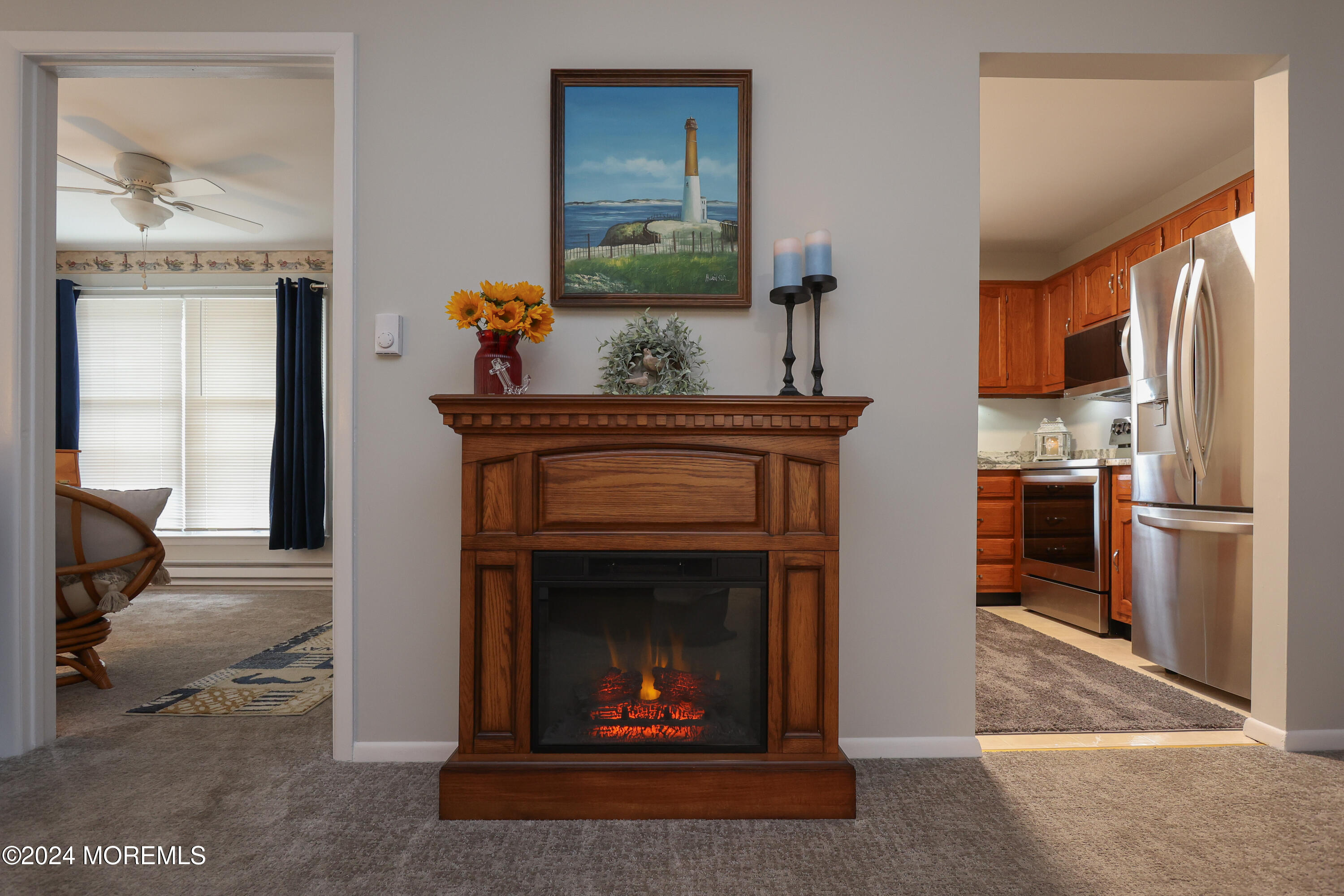 20 Cranberry Road, Unit 8 Manahawkin, NJ 08050 - Photo 14 of 42 a living room with a fireplace and a fireplace