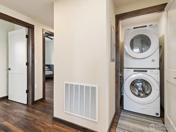 a view of a hallway with washer and dryer