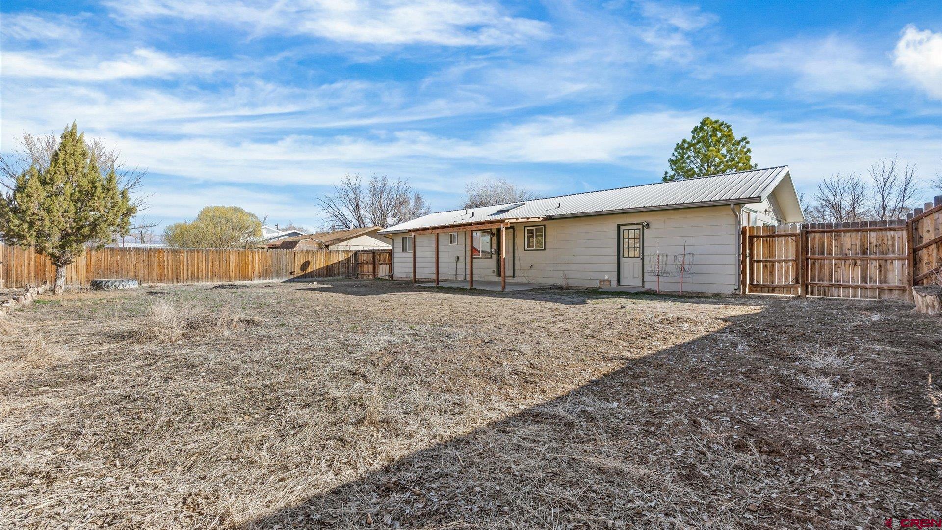 535 Labor Street Delta, CO 81416 - Photo 14 of 15 a view of a house with a yard
