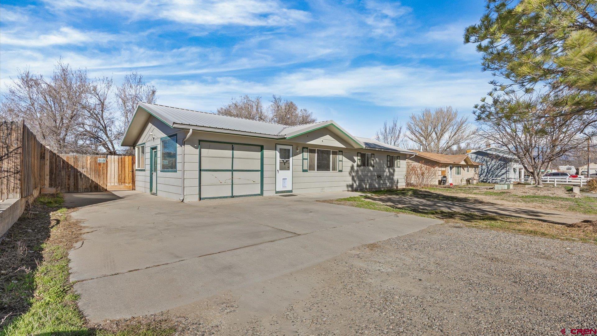 535 Labor Street Delta, CO 81416 - Photo 15 of 15 a view of a house with a large space and a large tree