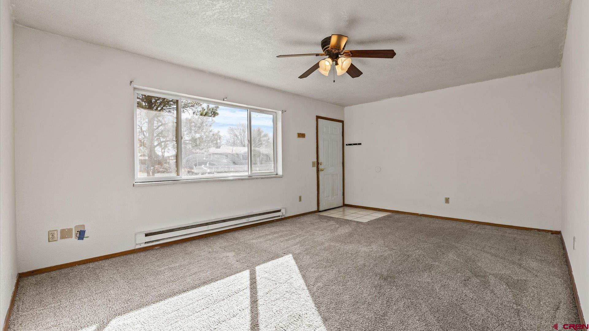 535 Labor Street Delta, CO 81416 - Photo 5 of 15 a view of an empty room with window