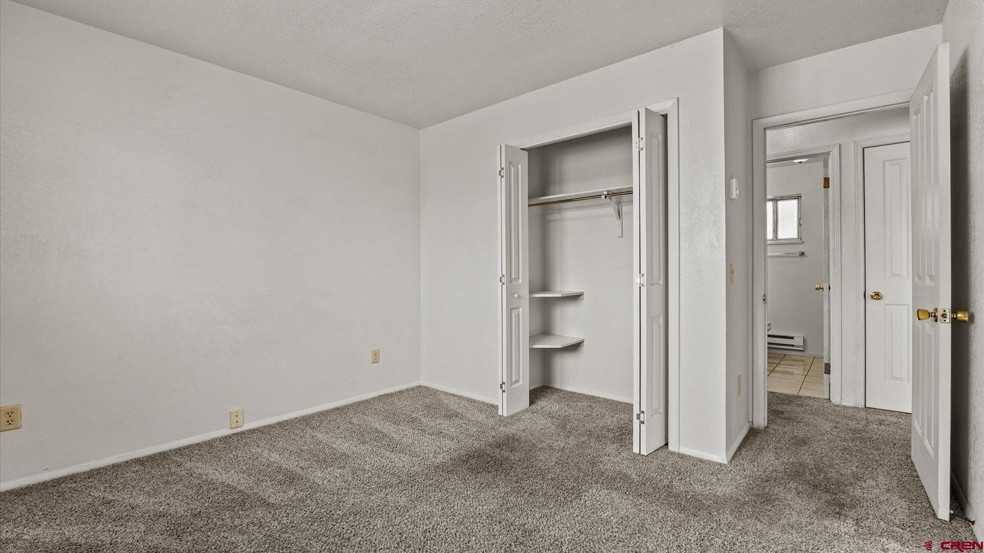 535 Labor Street Delta, CO 81416 - Photo 10 of 15 wooden floor and closet in a room