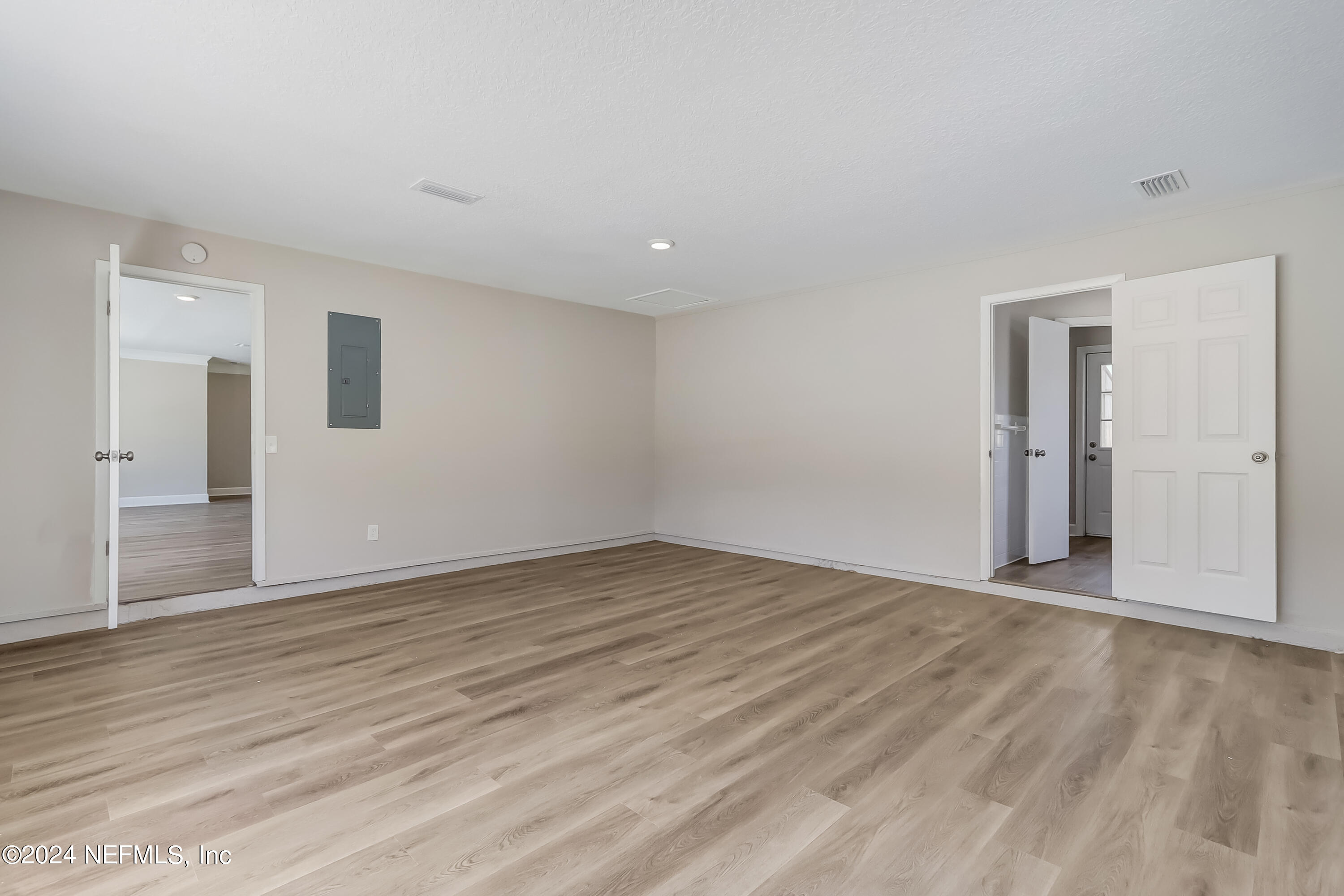 327 Neptune Road Orange Park, FL 32073 - Photo 31 of 40 wooden floor in an empty room