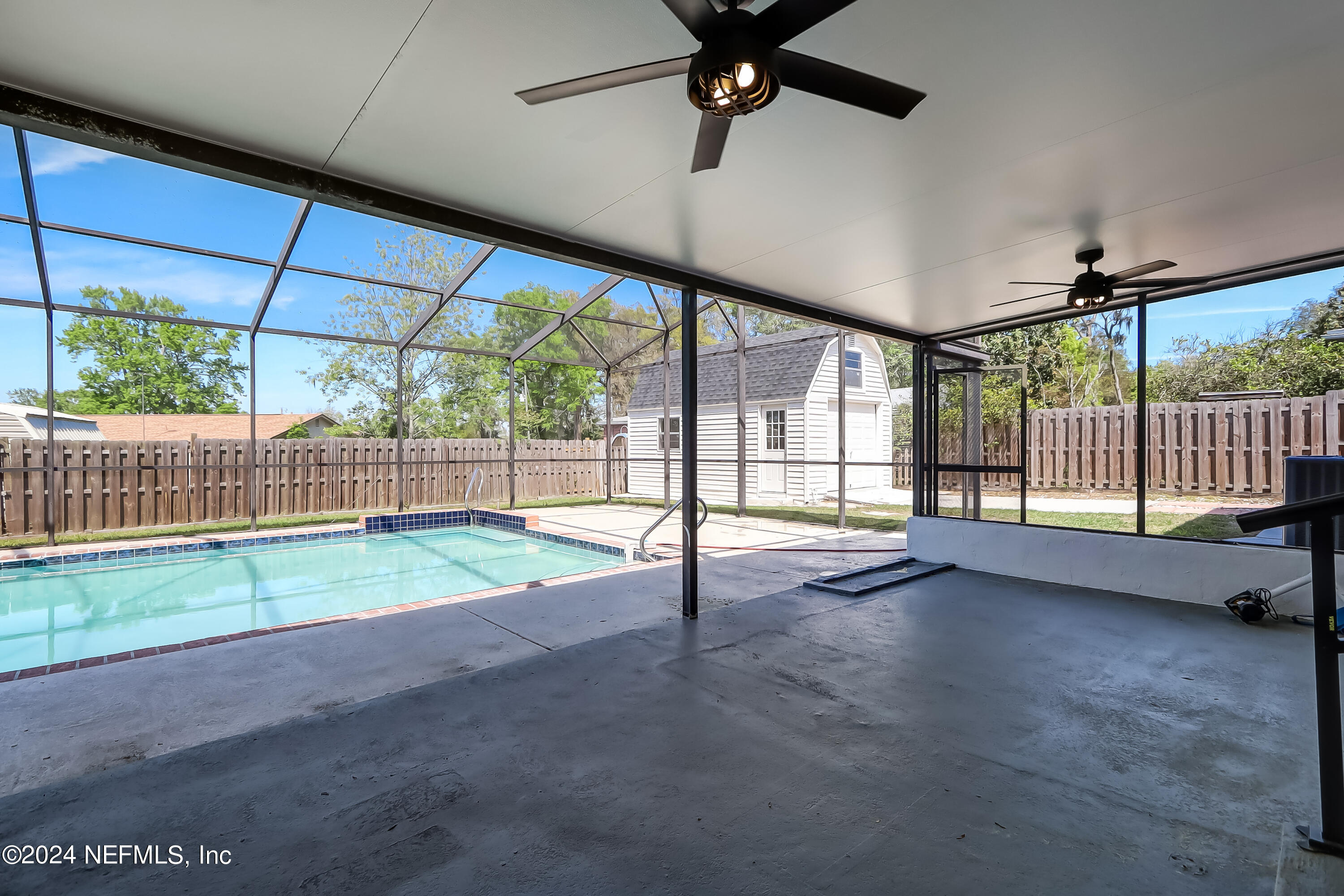 327 Neptune Road Orange Park, FL 32073 - Photo 34 of 40 a view of empty room with wooden floor
