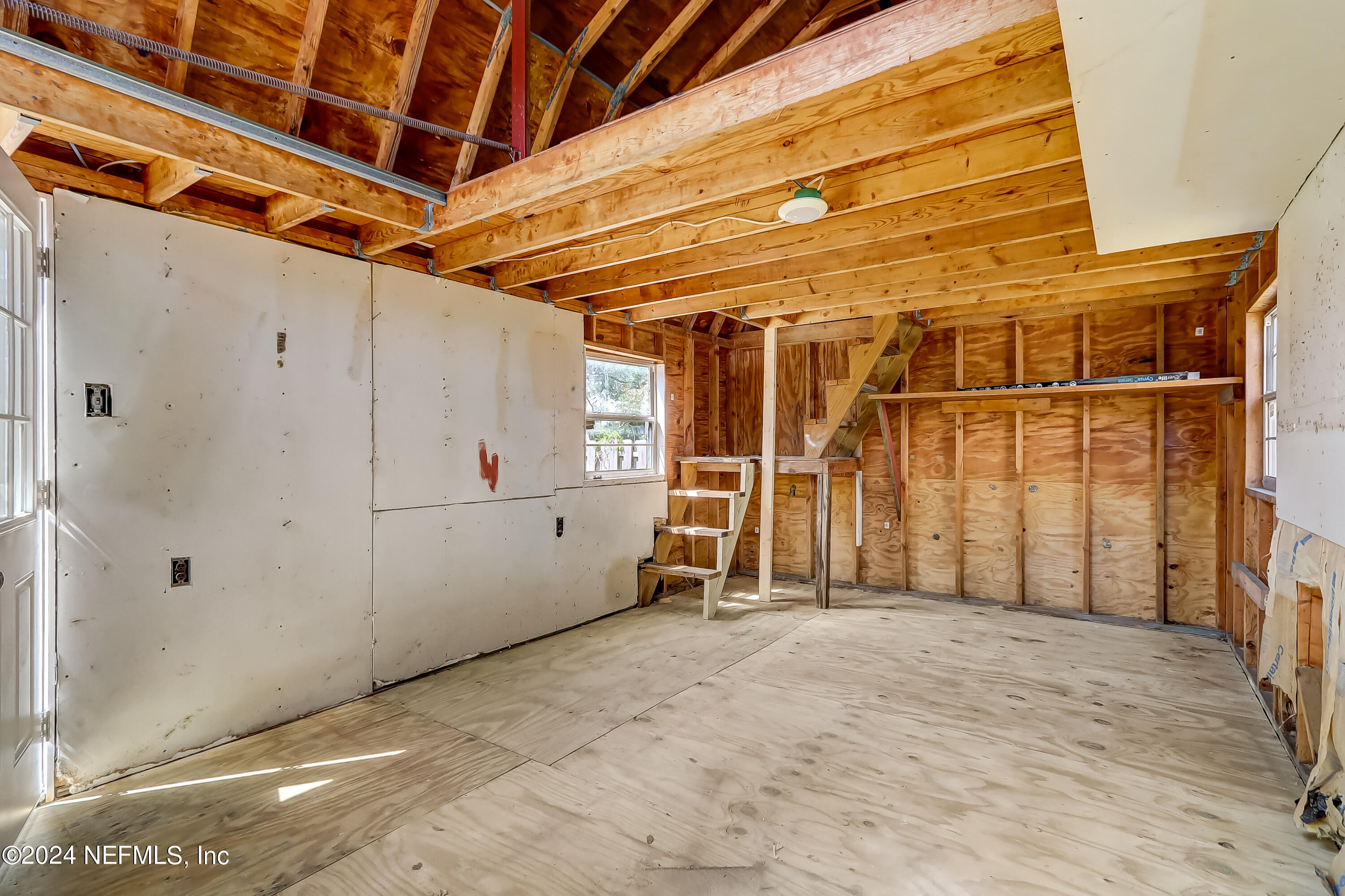 327 Neptune Road Orange Park, FL 32073 - Photo 39 of 40 a view of a room with wooden walls