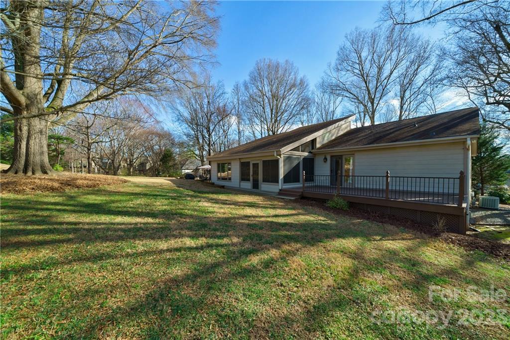 3942 Rounding Run Road Charlotte, NC 28277 - Photo 24 of 29 a view of a house with a yard
