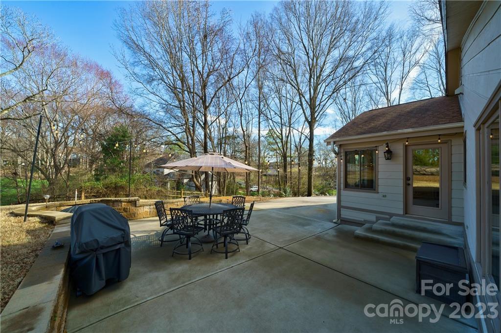 3942 Rounding Run Road Charlotte, NC 28277 - Photo 25 of 29 a view of a house with backyard and sitting area