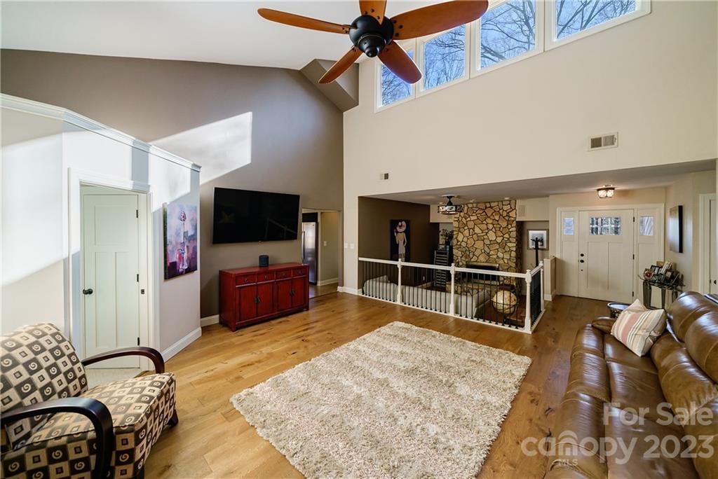 3942 Rounding Run Road Charlotte, NC 28277 - Photo 5 of 29 a bedroom with furniture and a flat screen tv