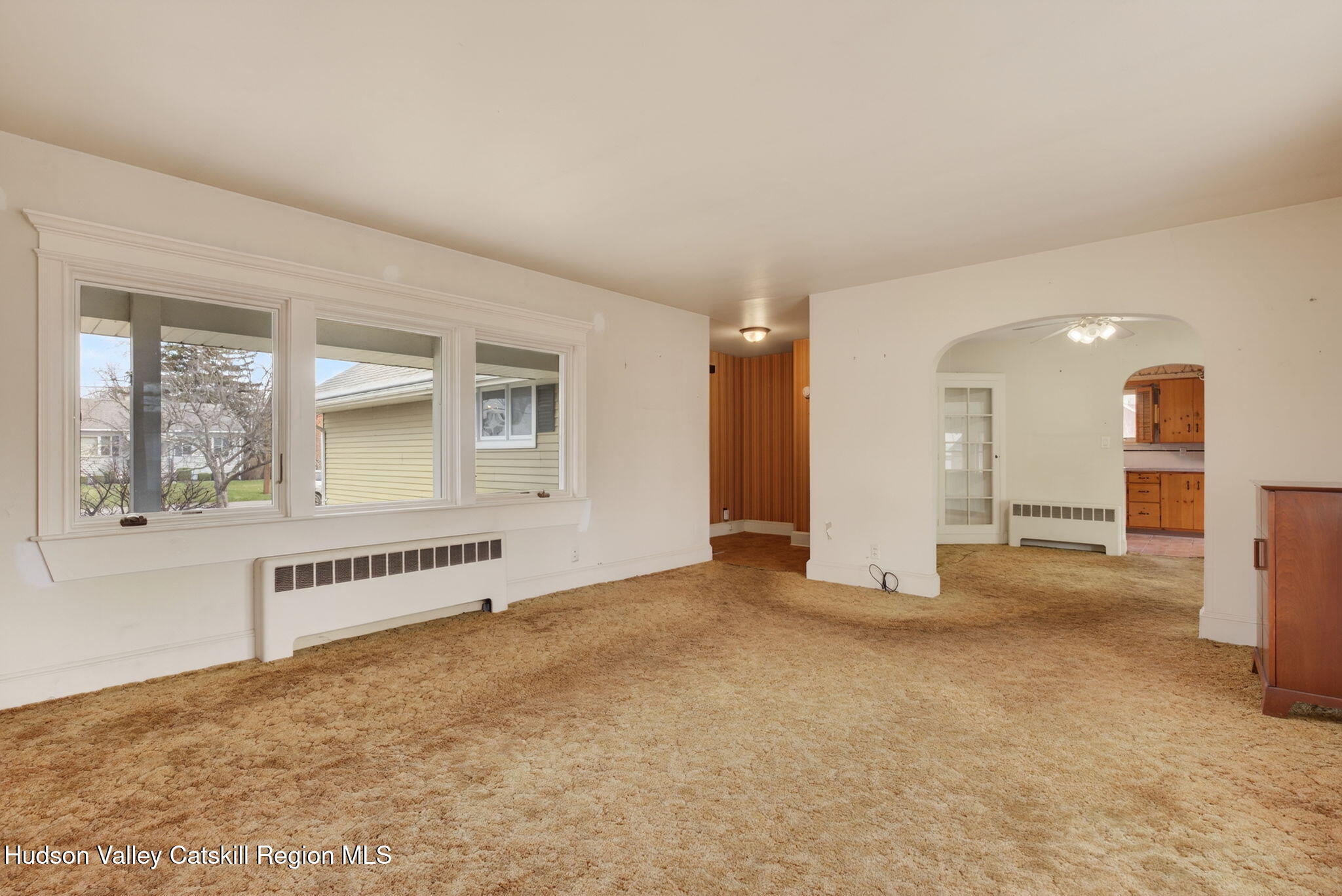 85 Harding Avenue Kingston, NY 12401 - Photo 5 of 41 wooden floor in an empty room with a window
