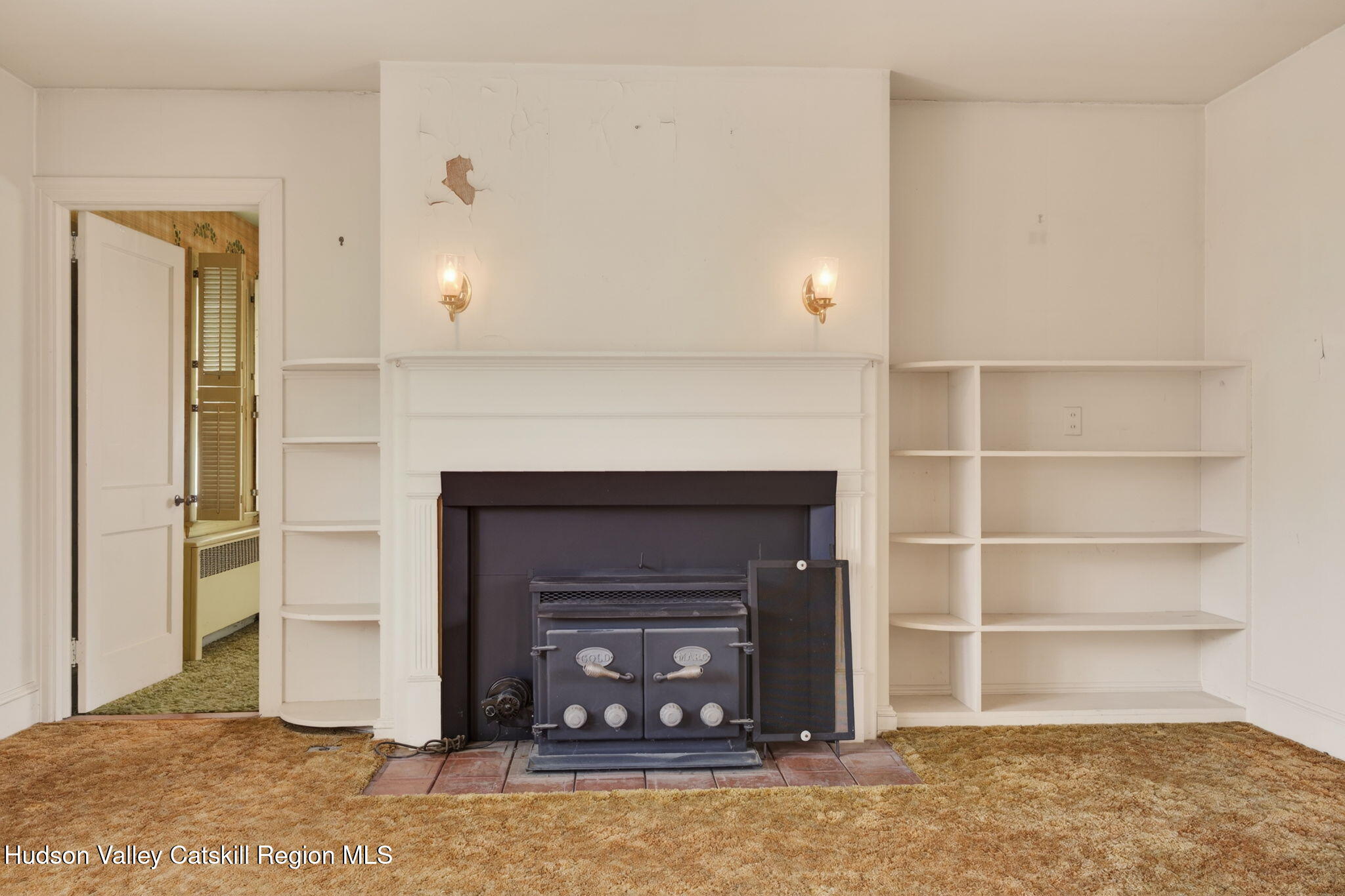 85 Harding Avenue Kingston, NY 12401 - Photo 6 of 41 a living room with a fireplace