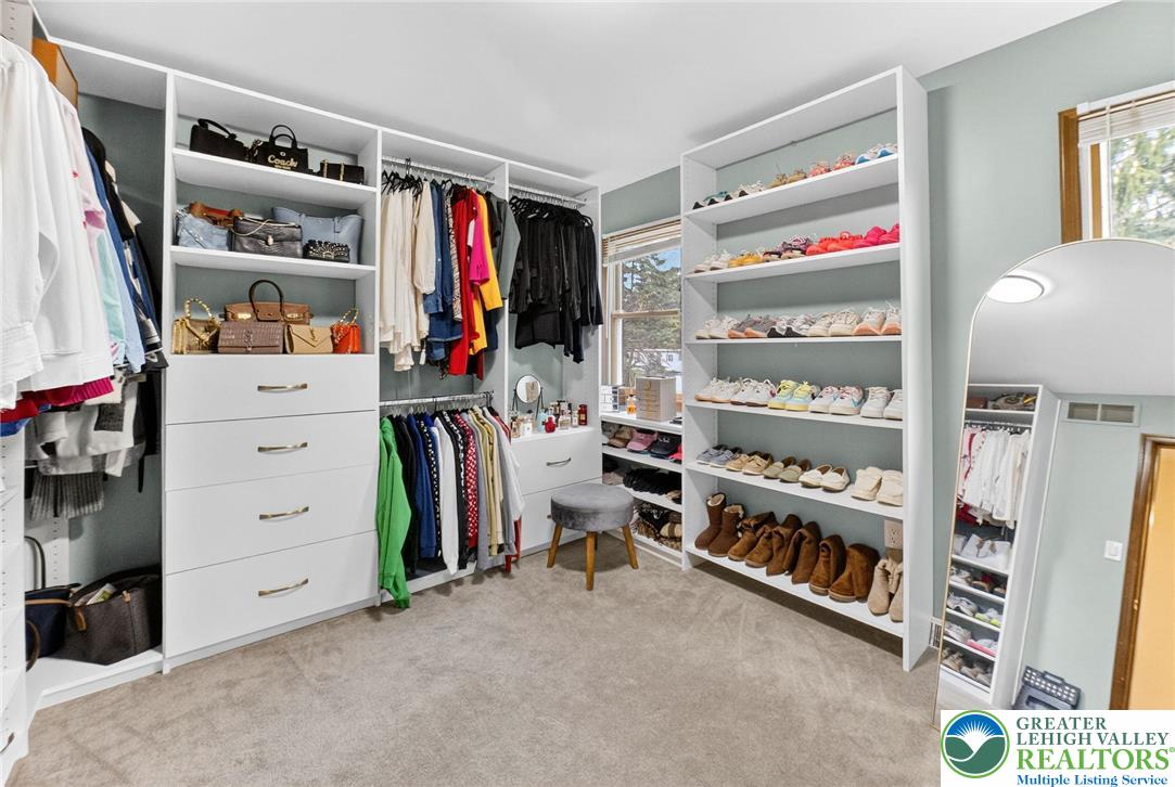 3746 Apple Road Orefield, PA 18069 - Photo 22 of 40 a view of walk in closet with clothes and shoes