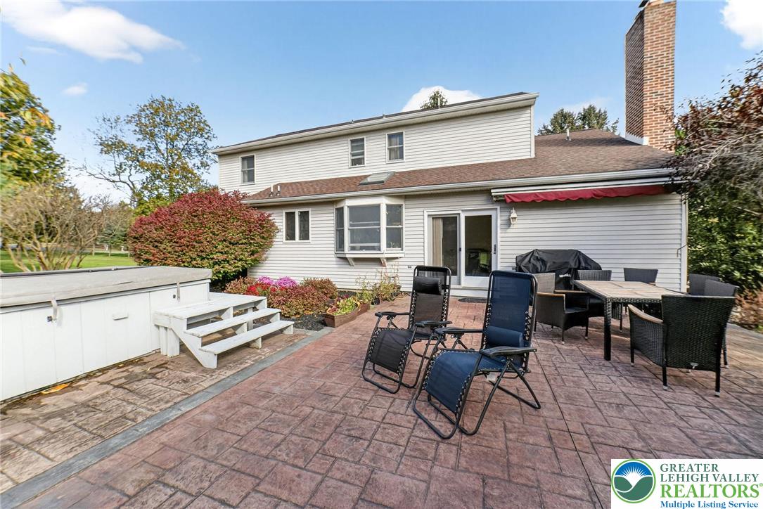 3746 Apple Road Orefield, PA 18069 - Photo 30 of 40 a view of a patio with table and chairs and potted plants