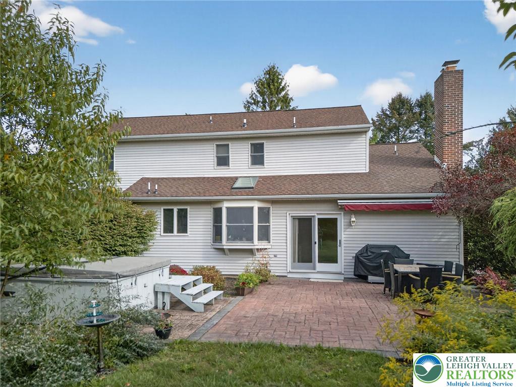 3746 Apple Road Orefield, PA 18069 - Photo 31 of 40 a backyard of a house with table and chairs