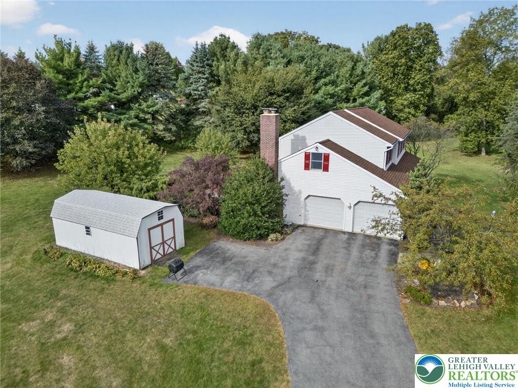 3746 Apple Road Orefield, PA 18069 - Photo 35 of 40 a view of a two chairs in a backyard