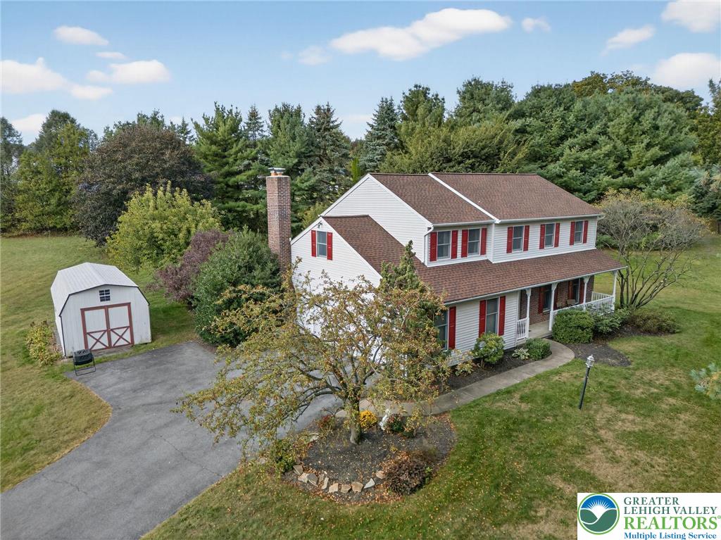3746 Apple Road Orefield, PA 18069 - Photo 40 of 40 a aerial view of a house with garden space and trees