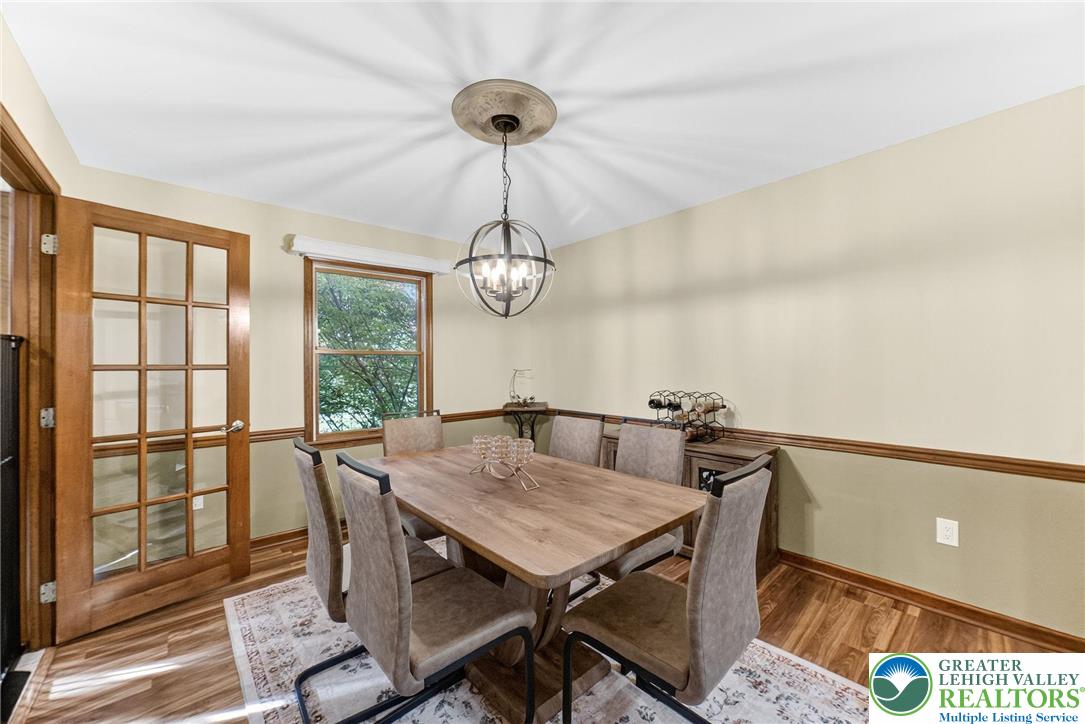 3746 Apple Road Orefield, PA 18069 - Photo 6 of 40 a view of a dining room with furniture window and wooden floor