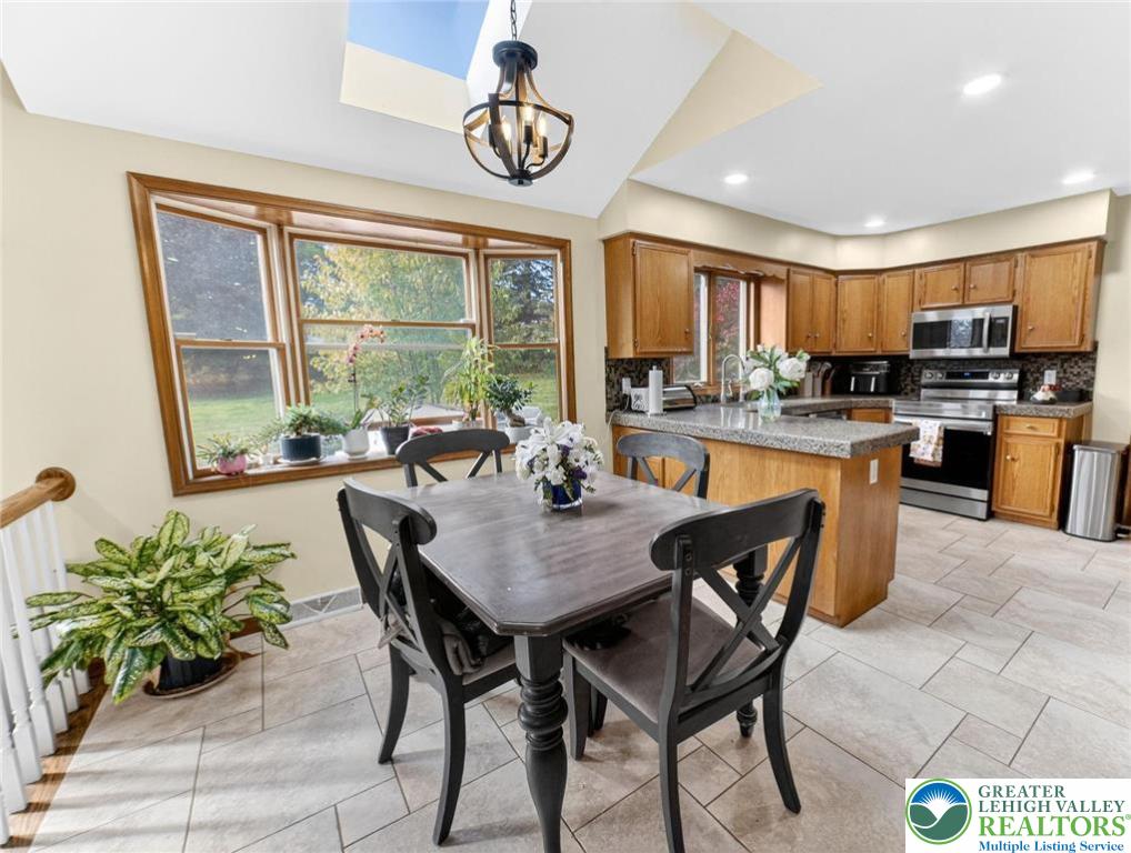 3746 Apple Road Orefield, PA 18069 - Photo 10 of 40 a view of a dining room with furniture window and outside view