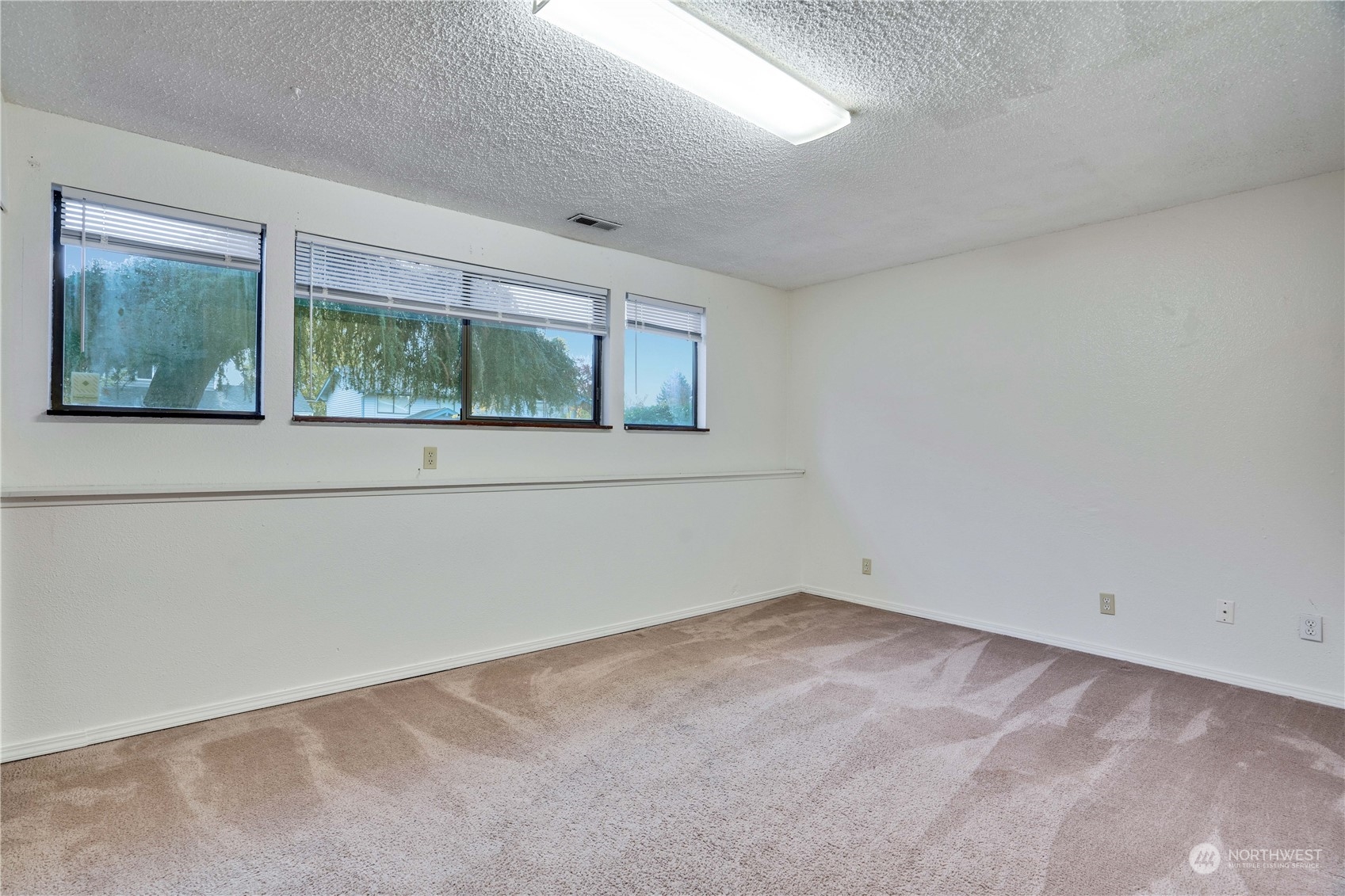 2813 Southwest 342nd Street Federal Way, WA 98023 - Photo 19 of 34 an empty room with a window