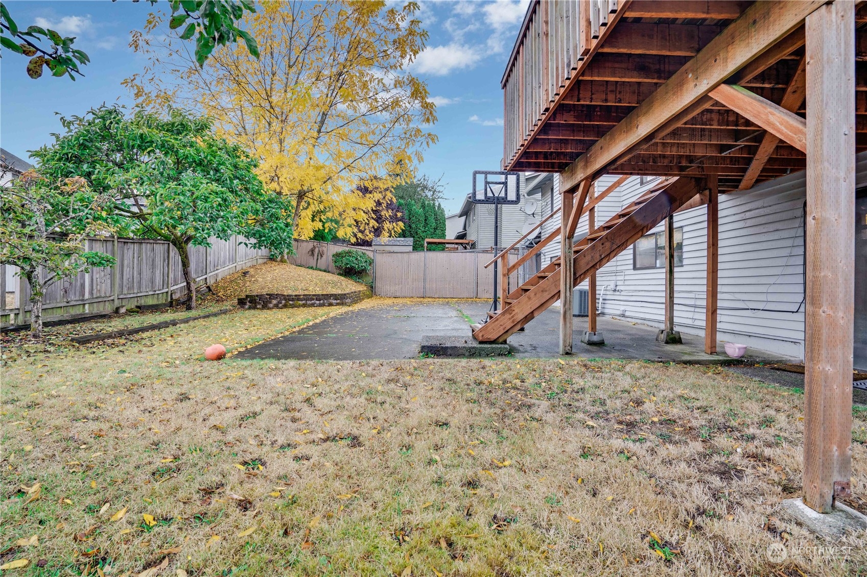 2813 Southwest 342nd Street Federal Way, WA 98023 - Photo 29 of 34 a backyard of a house with a tree