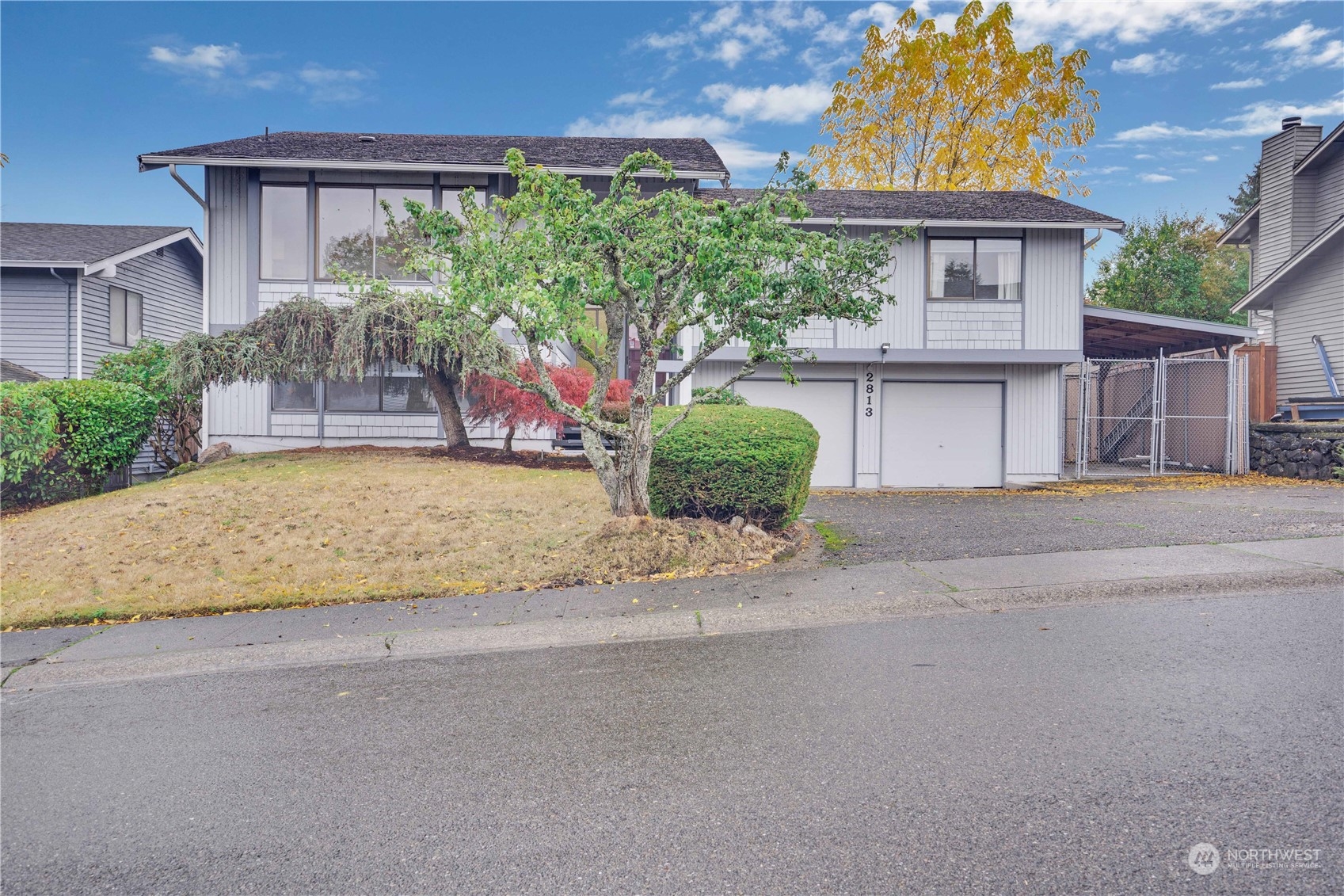 2813 Southwest 342nd Street Federal Way, WA 98023 - Photo 3 of 34 a house view with a outdoor space