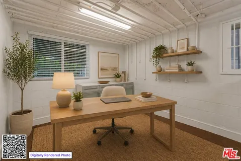 a view of a workspace with furniture