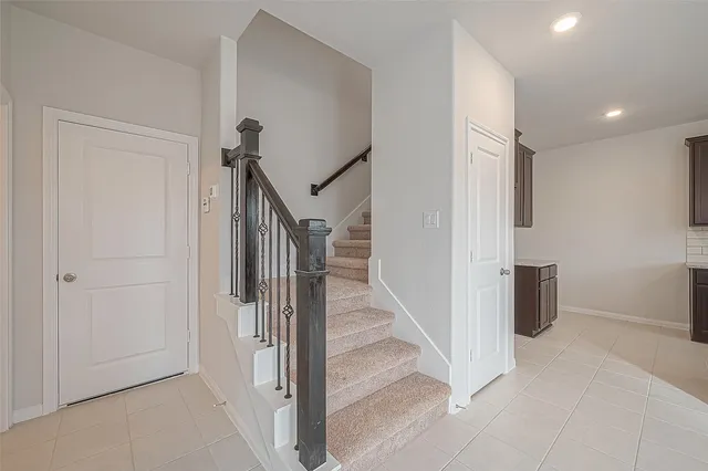 a view of a hallway with staircase