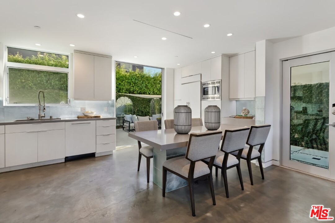 808 Brooks Avenue Venice, CA 90291 - Photo 13 of 47 a view of a dining room with furniture window and outside view