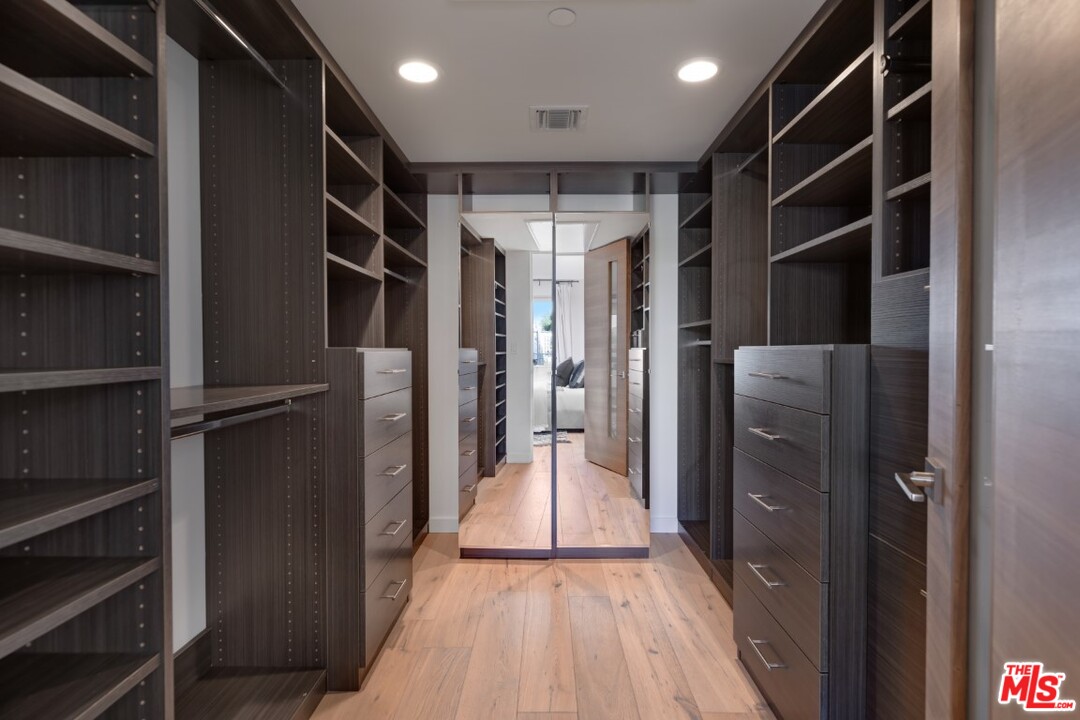 808 Brooks Avenue Venice, CA 90291 - Photo 33 of 47 a view of walk in closet with empty racks