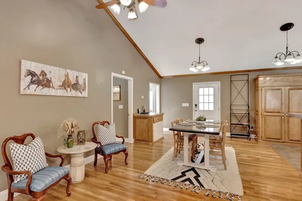 a view of a workspace with furniture and lounge chair