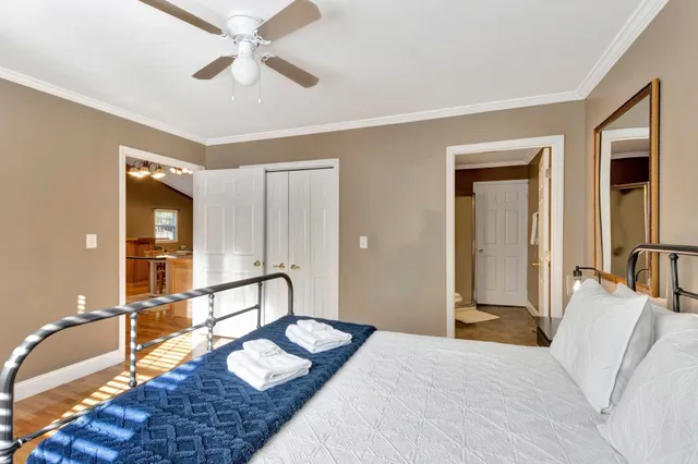 a view of a living room with a large window